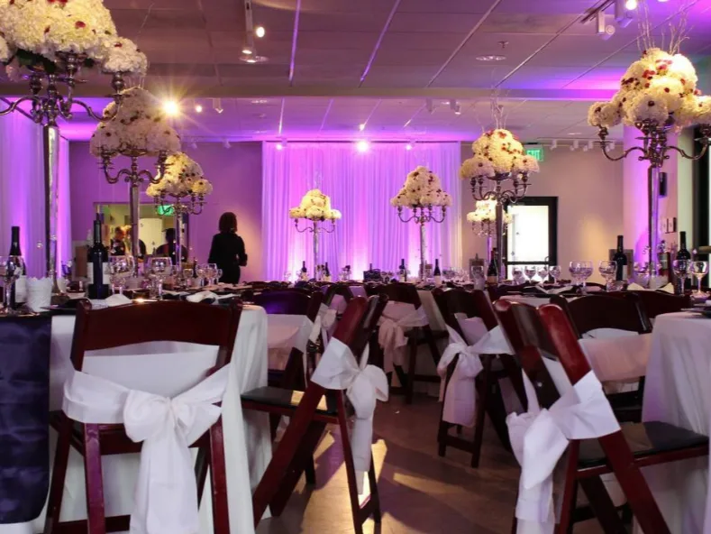 Purple uplighting on centerpieces
