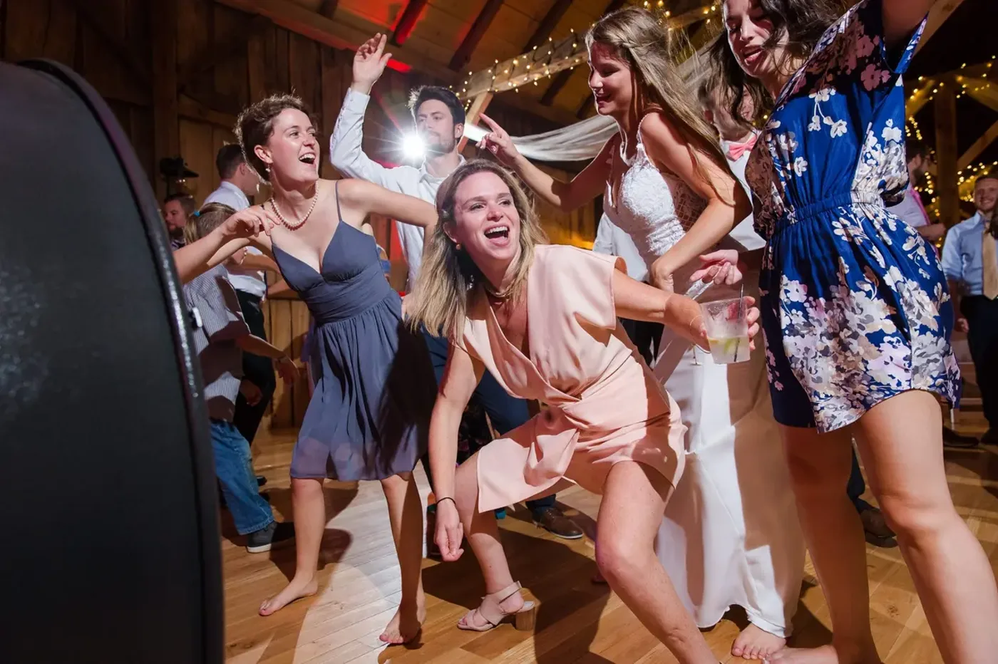 Guests packing the dance floor at a wedding reception