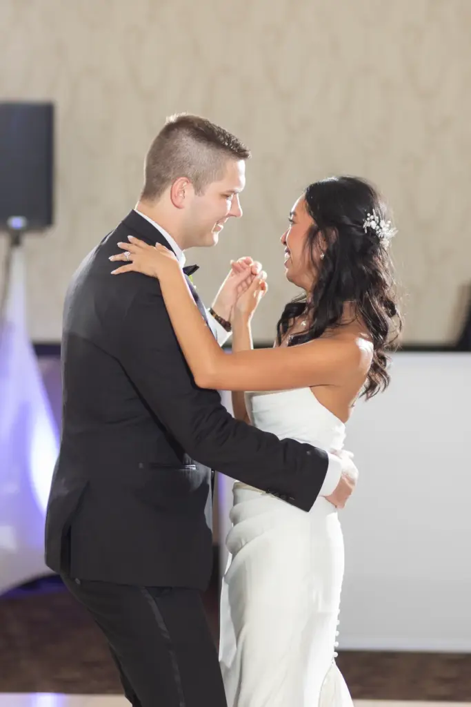 Wedding dance floor glowing under purple uplighting