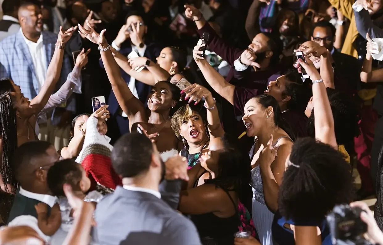The whole room on their feet at a reception