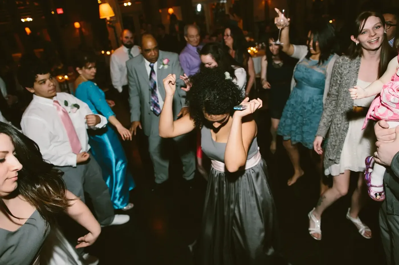 The whole room on their feet at a celebration