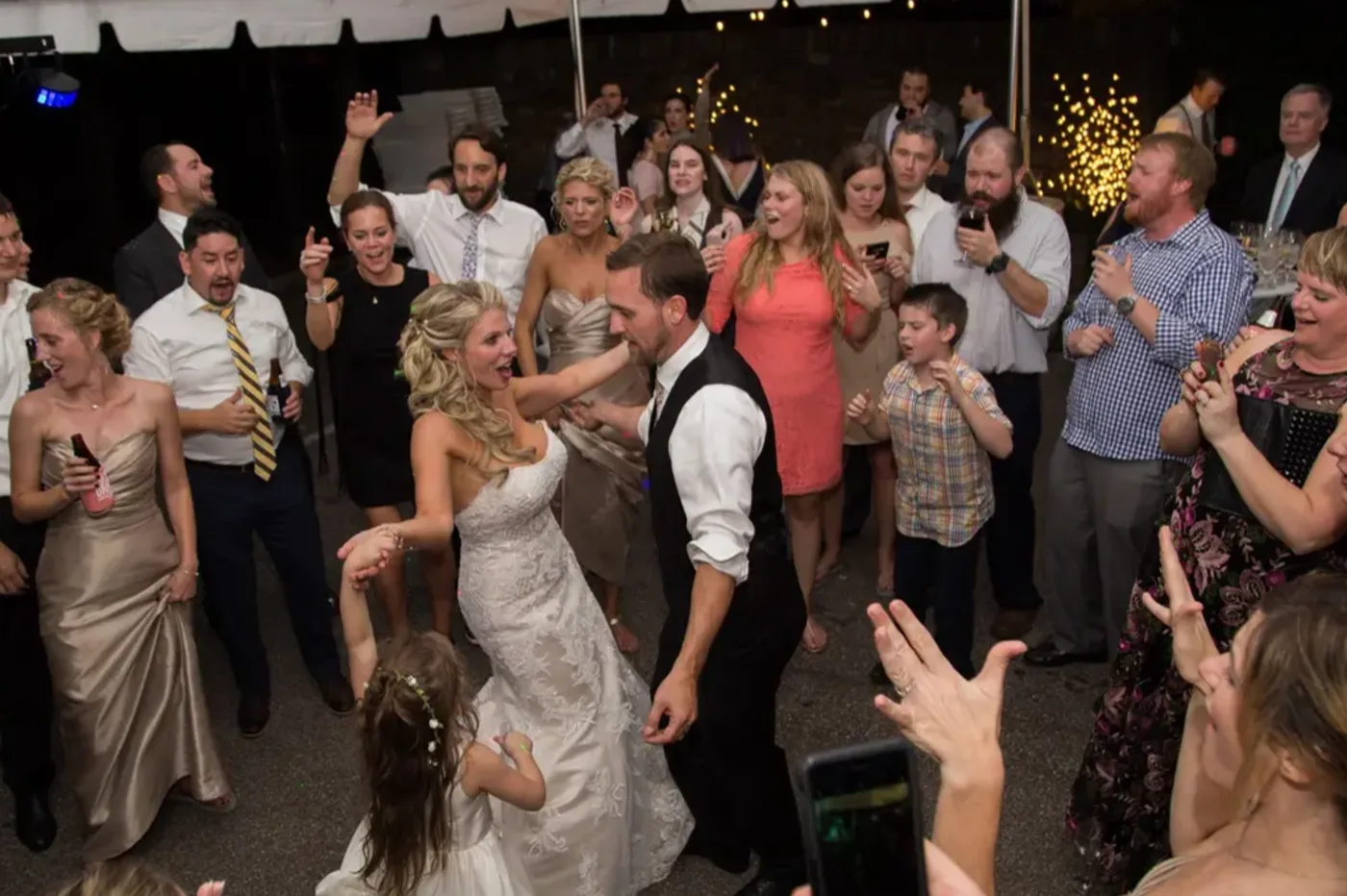 A packed dance floor mid-celebration