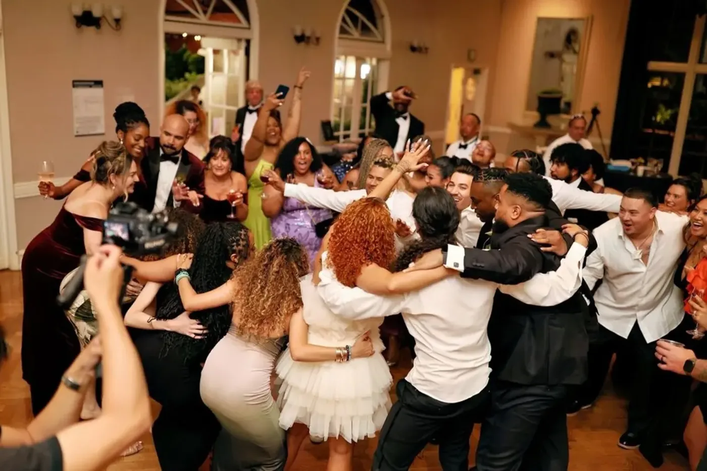 Wedding party dancing together